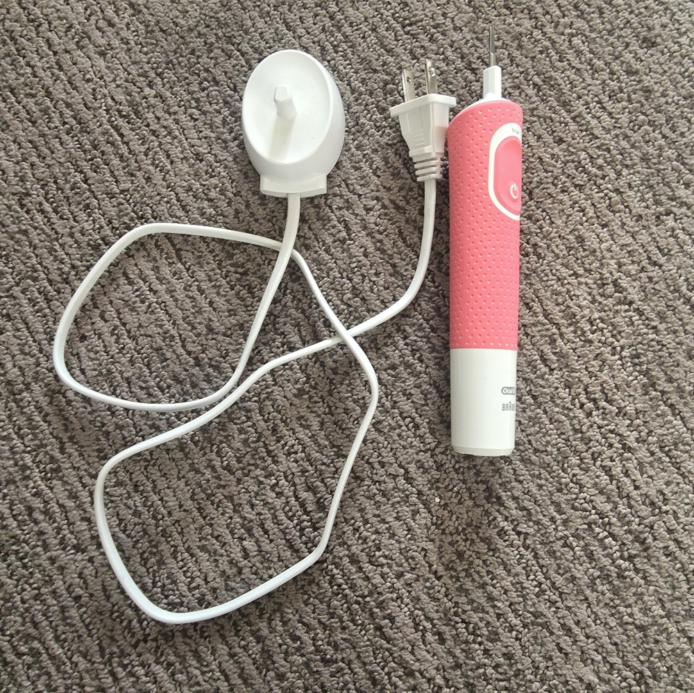 Sleek Pink Electric Toothbrush with Charger